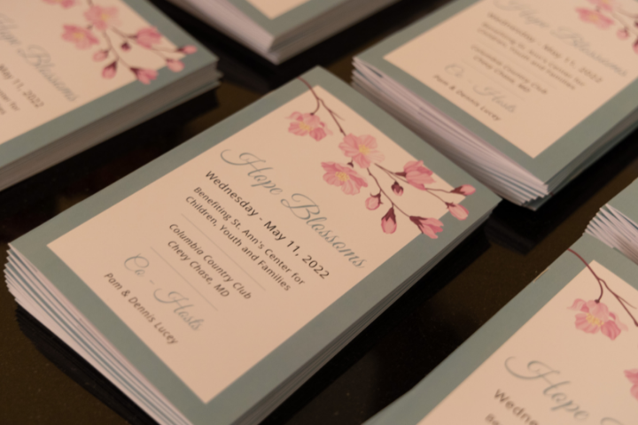 Photo of Hope Blossoms program booklets on a tabletop